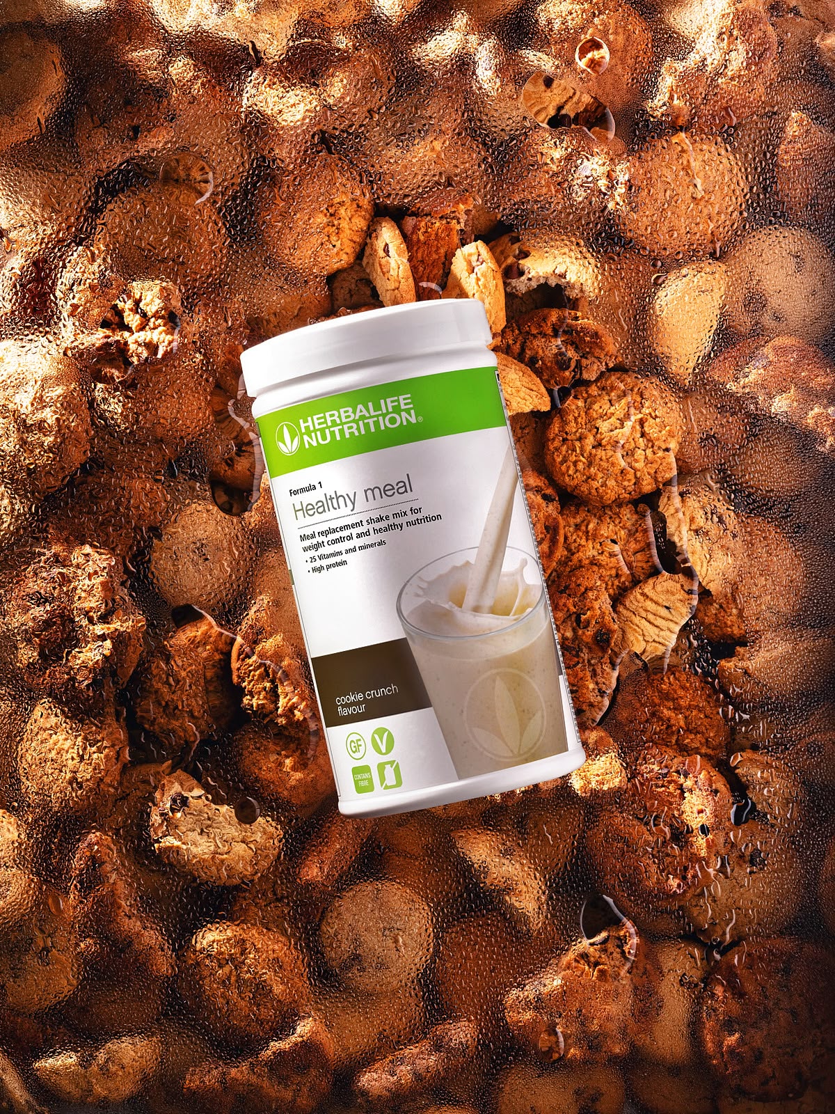 Herbalife Formula 1 chocolate shake mix on cookie background — advertising product photography